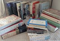 Overall view of 21 assorted opera and classical music books, upright and stacked