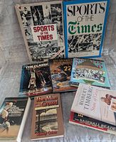 Group shot of all ten books laid out, titles visible