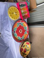 Group shot of both bowls, lemon tray and boxed shot glasses