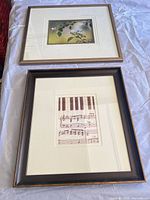 Framed print shown full view alongside another frame (only lower print included in lot)