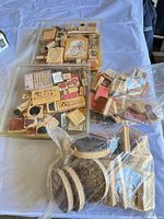 overview of stamps in three storage boxes and bag