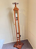 Full view of wooden floor lamp showing overall design and height