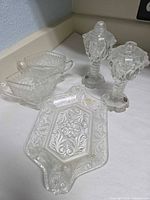 Entire five-piece pressed glass set