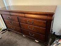 Front view showing full dresser, drawer layout, hardware