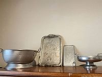 Group shot of all four aluminum serveware pieces