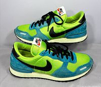 Left and right sneakers lateral view