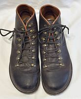 Top view of both boots showing lacing system and toe condition