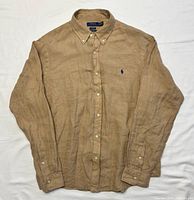 Front view of tan linen Polo Ralph Lauren shirt fully buttoned