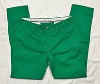 Front view of green Bedford Chino pants showing waistband, pockets, full leg