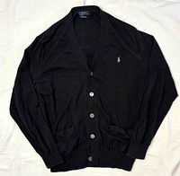 Front view of black Polo Ralph Lauren cardigan laid flat