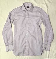 Front view of striped Tom Ford shirt laid flat
