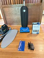 Riccar upright, Husky canister, HEPA bag box, ironing board, manual, charger