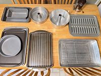 Overview of all bakeware pieces laid on table