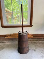 Full view wooden butter churn with dasher and lid