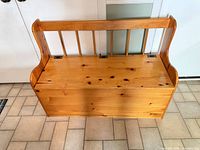 Front view of pine bench closed