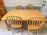table with four chairs front view