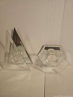 Both candle holders side by side showing overall forms