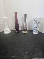 all four vases front view