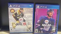 Front view of PS4 NHL 15 and NHL 20 game cases