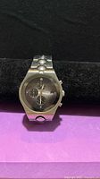 Front view of Fossil Arkitekt stainless chronograph watch on display pillow