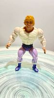 Front view of Prince Adam action figure standing upright