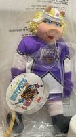 Full view of sealed Miss Piggy plush in bag