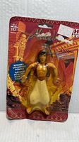 front view of sealed Aladdin bendable figure in blister pack