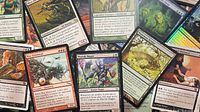 scattered view of assorted MTG cards highlighting different colors and types