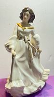 Front angled view of Royal Doulton Free Spirit figurine
