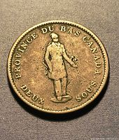 Obverse showing standing figure and legends