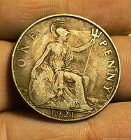 Reverse showing Britannia, date 1921, toned bronze