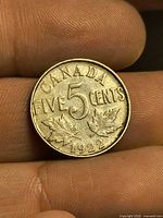 Reverse side showing CANADA, denomination, maple leaves, date 1922