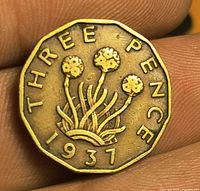 Reverse side showing thrift plant design, date 1937 and denomination