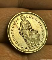 Obverse showing seated Helvetia with shield and stars