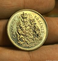 Reverse of 1971 Canadian 50 cent coin showing Coat of Arms
