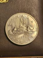Reverse side of 1978 Canadian dollar showing Voyageur canoe design