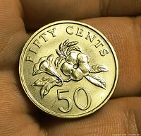 Reverse of Singapore 50-cent coin with allamanda flower and denomination