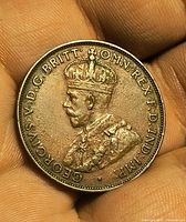 Obverse showing King George V crowned bust and inscription