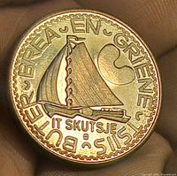 Obverse showing sailboat, Frisian text and heart motif