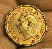Obverse showing King George VI portrait and inscription GEORGIVS VI D G REX ET IND IMP