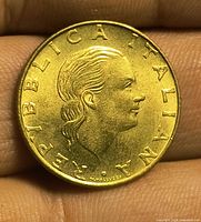 Obverse showing female head and legend