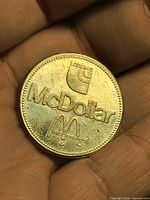 Obverse showing Loblaws logo, McDollar text, McDonald’s arches