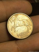 Reverse of 1960 Norway 1 Krone coin showing horse design