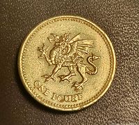 Reverse showing heraldic Welsh dragon and denomination ONE POUND