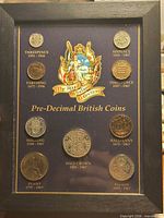 Front view of framed Royal Windsor Collection pre-decimal coin set
