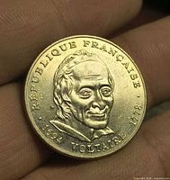 Obverse showing Voltaire portrait, legend, years 1694-1778