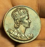 Obverse showing crowned bust of Queen Elizabeth II with missing rim
