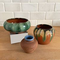 Front view of all three pottery pieces