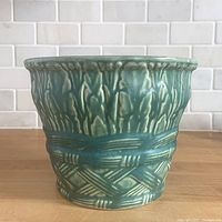 Oblique view showing full exterior design of planter