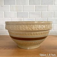 Side profile showing banded decoration and diamond pattern